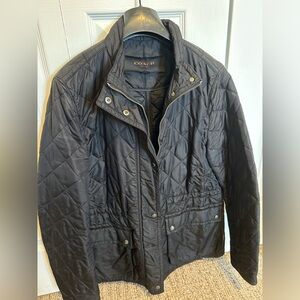 Woman’s authentic Coach jacket. Size medium. Black. With bag